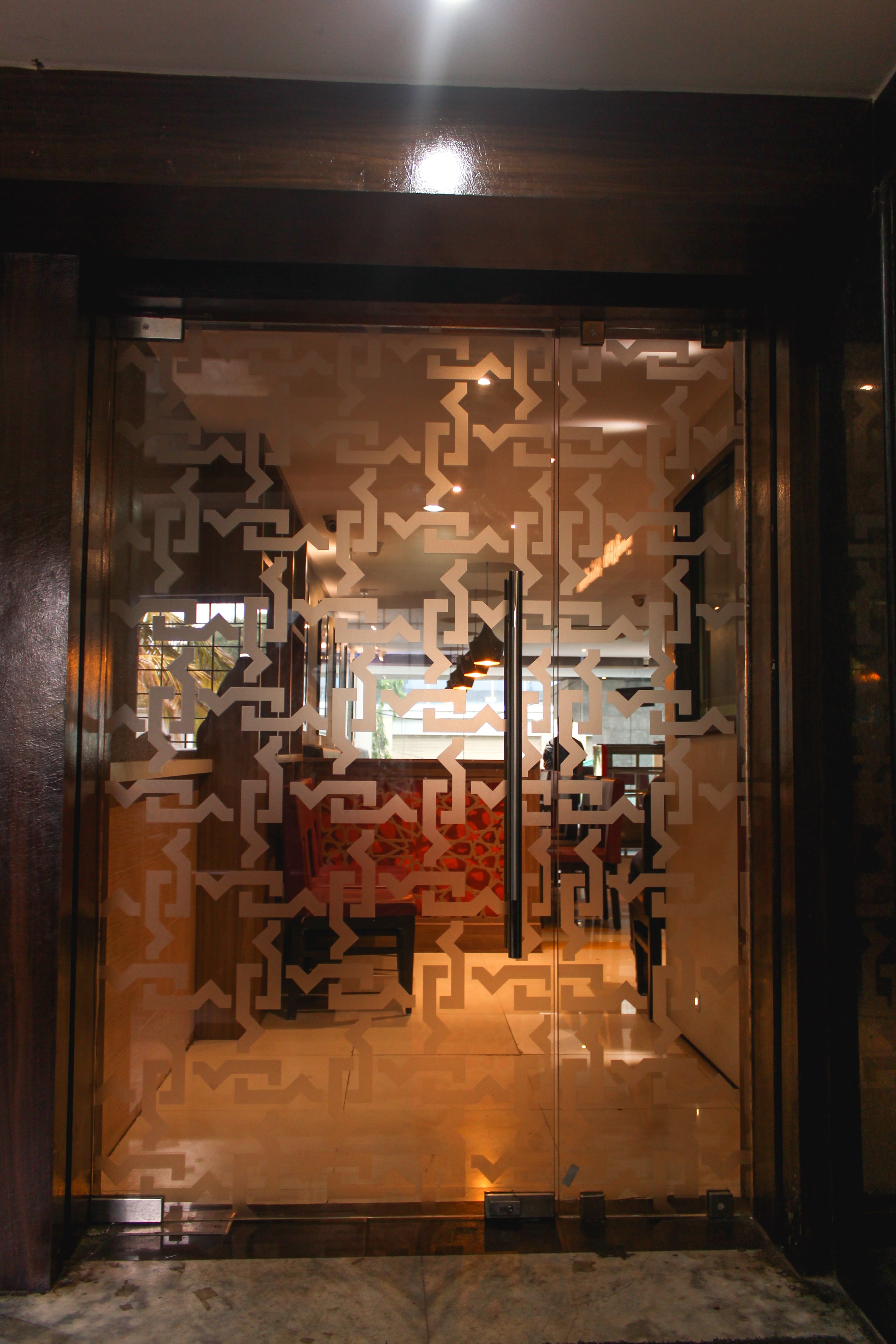 Entrance with dining seating visible at Mandi@36